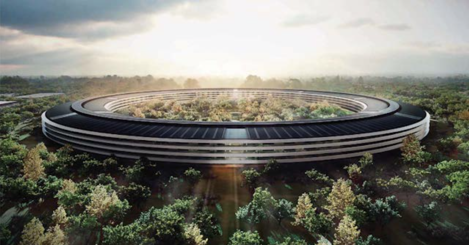 Figure 9. Concept drawing of Apple’s new “Spaceship” headquarters. (Source: Techboss24, http://techboss24.blogspot.com/2013/11/apples-new-spaceship-campus-see-unseen.html